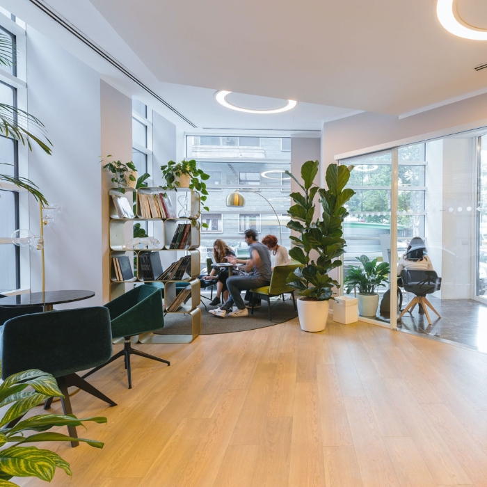 Modern commercial office space with people working