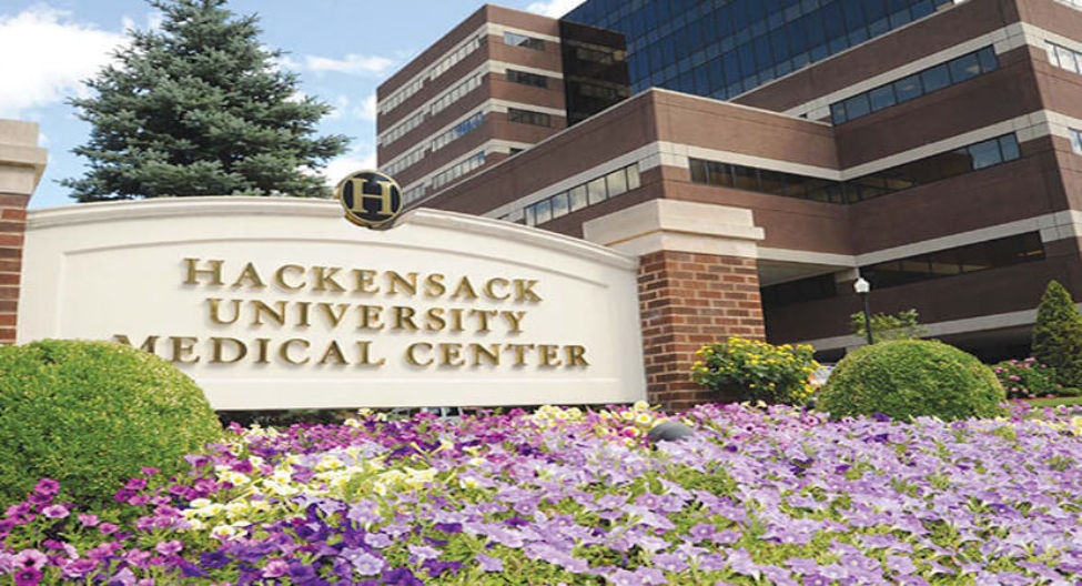 A building entrance sign for Hackensack University Medical Center