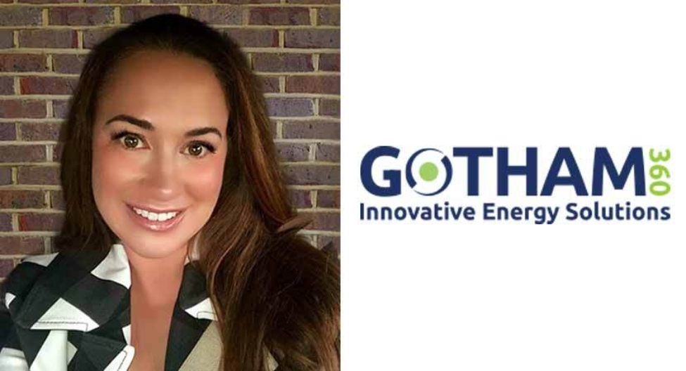 Jennifer Kearney, Gotham 360 energy consultant, smiling with a brick background 